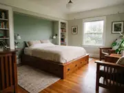 Small bedroom with a wood platform bed frame with built-in storage drawers and no separate dresser