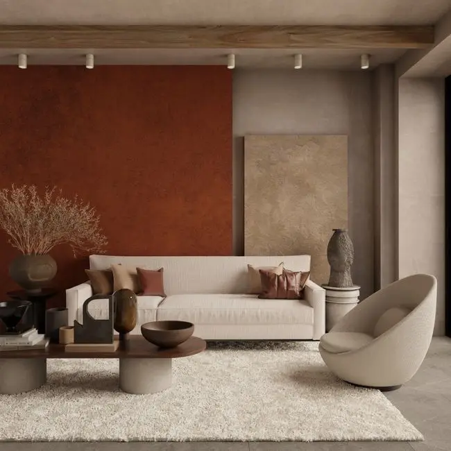 An organic modern living room with a terracotta accent wall, a cream boucle sofa, and a live-edge wood coffee table