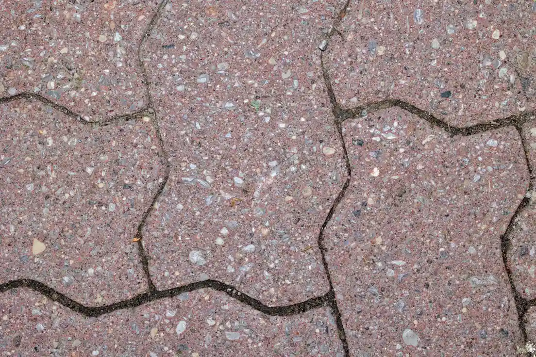 Close-up of paver joints filled with sand between individual stones